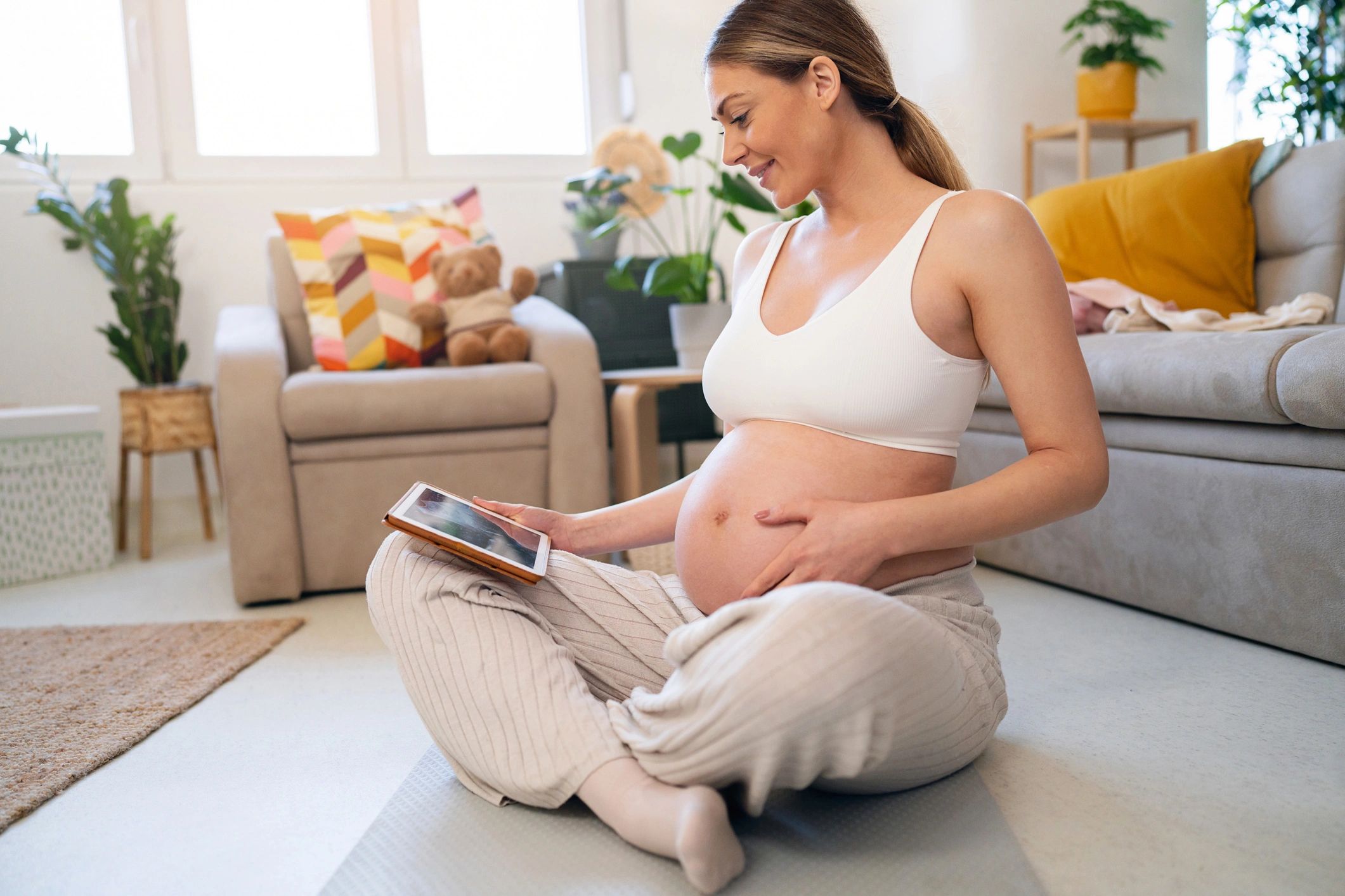 Parent using a tablet at home